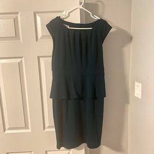 Teal peplum style dress from Rickis. Size 12. Jersey material
